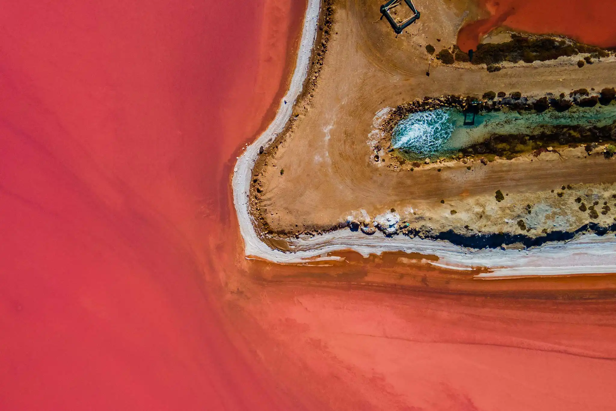 Aerial view of a coastline meeting the ocean